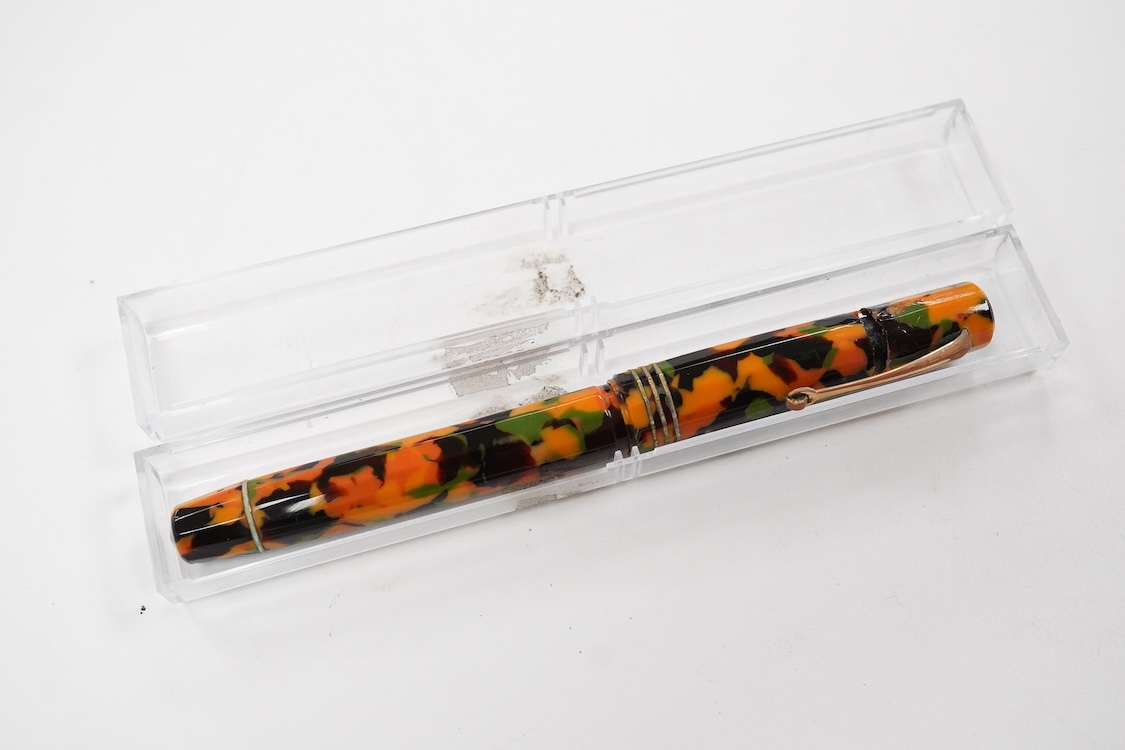 An Omas orange, green and black marble Paragon fountain pen (shrinkage to cap)